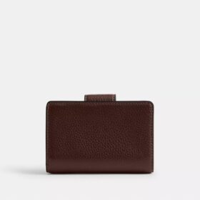 Cartera mediana con cremallera en la esquina
