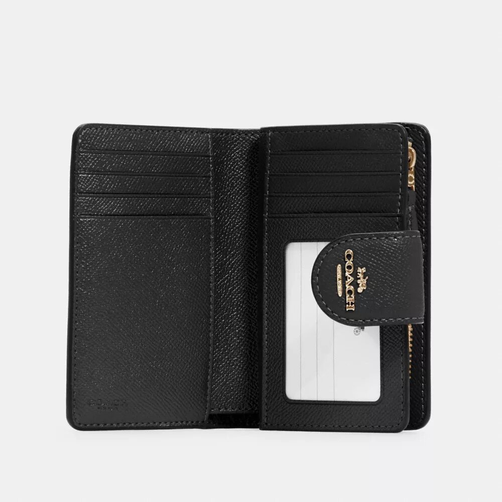 Cartera mediana con cremallera en la esquina