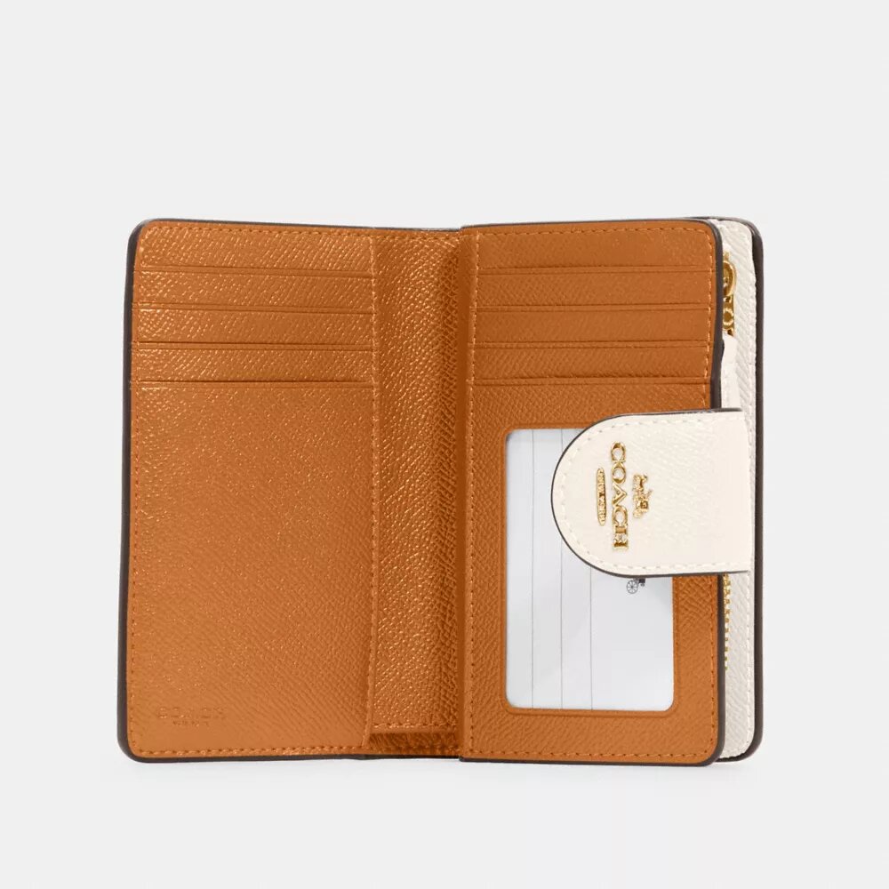 Cartera mediana con cremallera en la esquina