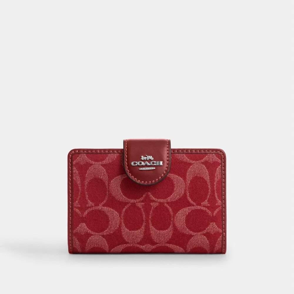 Cartera mediana con cremallera en las esquinas en denim característico