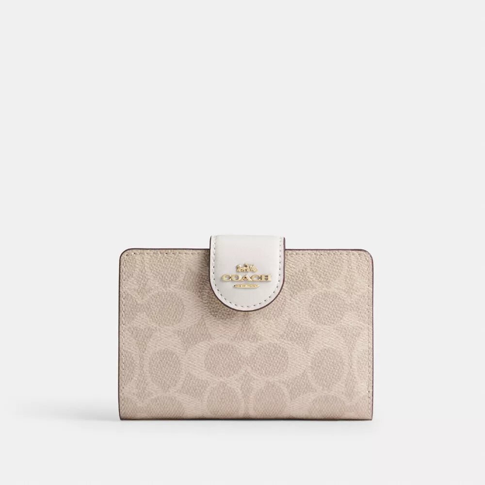 Cartera mediana con cremallera en las esquinas, en Signature Canvas