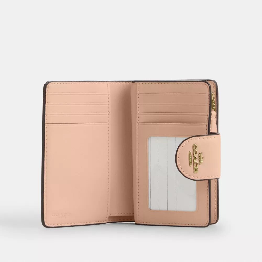 Cartera mediana con cremallera en las esquinas, en Signature Canvas