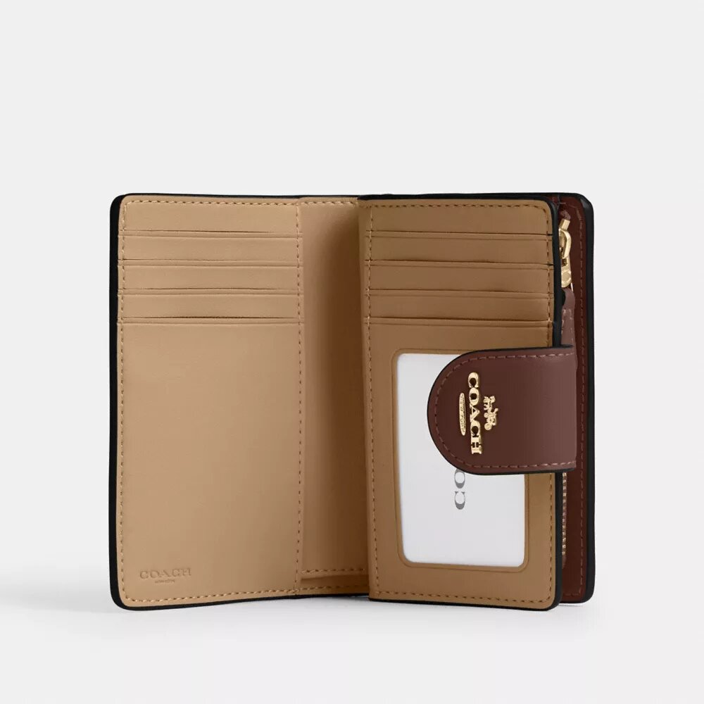 Cartera mediana con cremallera en las esquinas, en Signature Canvas