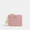 Cartera pequeña con cremallera en esquina, de denim exclusivo con Charms