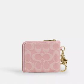 Cartera pequeña con cremallera en esquina, de denim exclusivo con Charms
