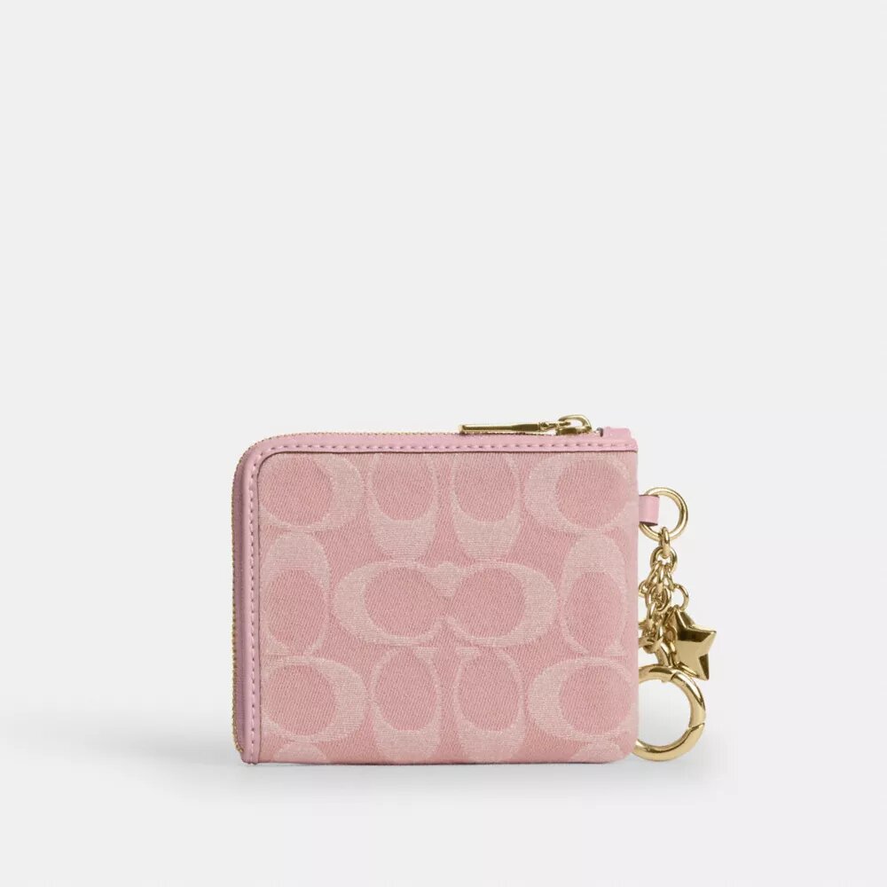 Cartera pequeña con cremallera en esquina, de denim exclusivo con Charms