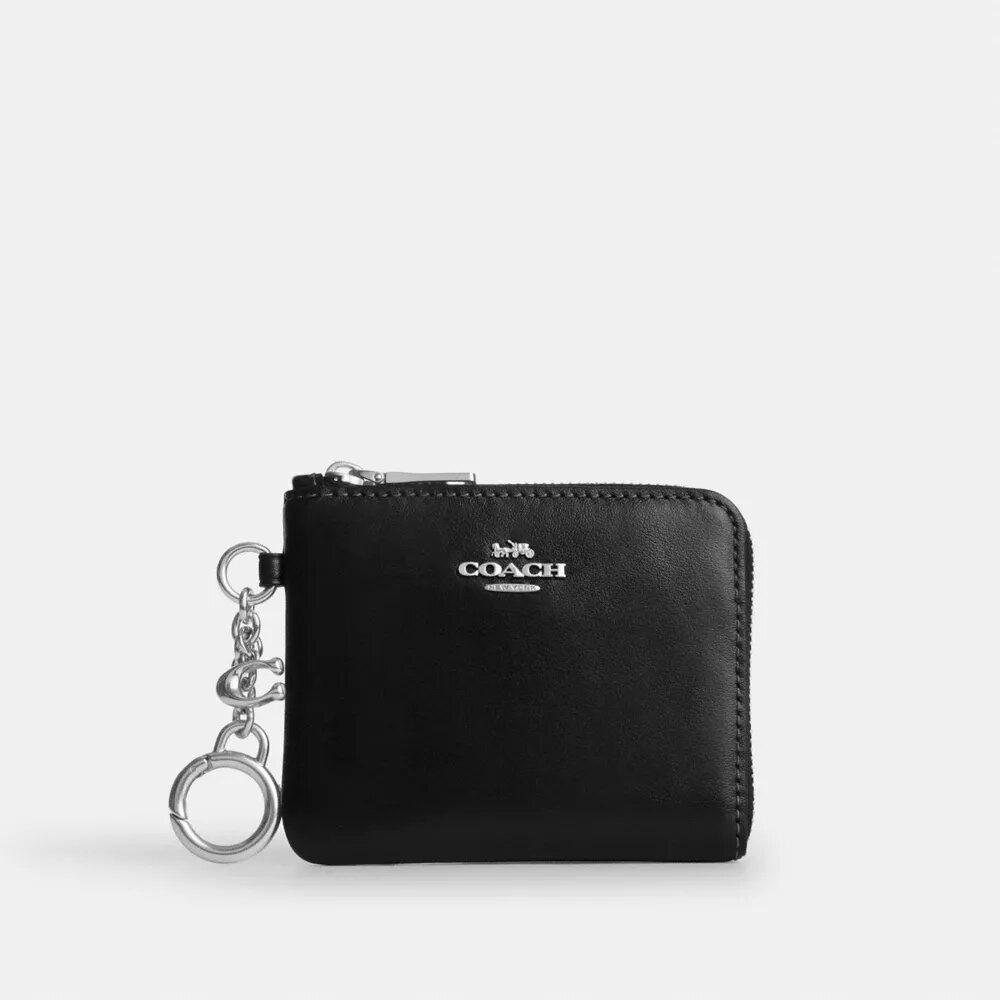 Cartera pequeña con cremallera en la esquina