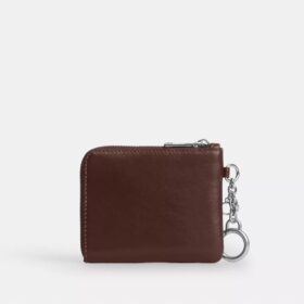 Cartera pequeña con cremallera en la esquina