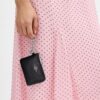 Cartera pequeña con cremallera en la esquina