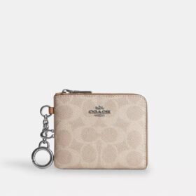 Cartera pequeña con cremallera en las esquinas de Signature Canvas