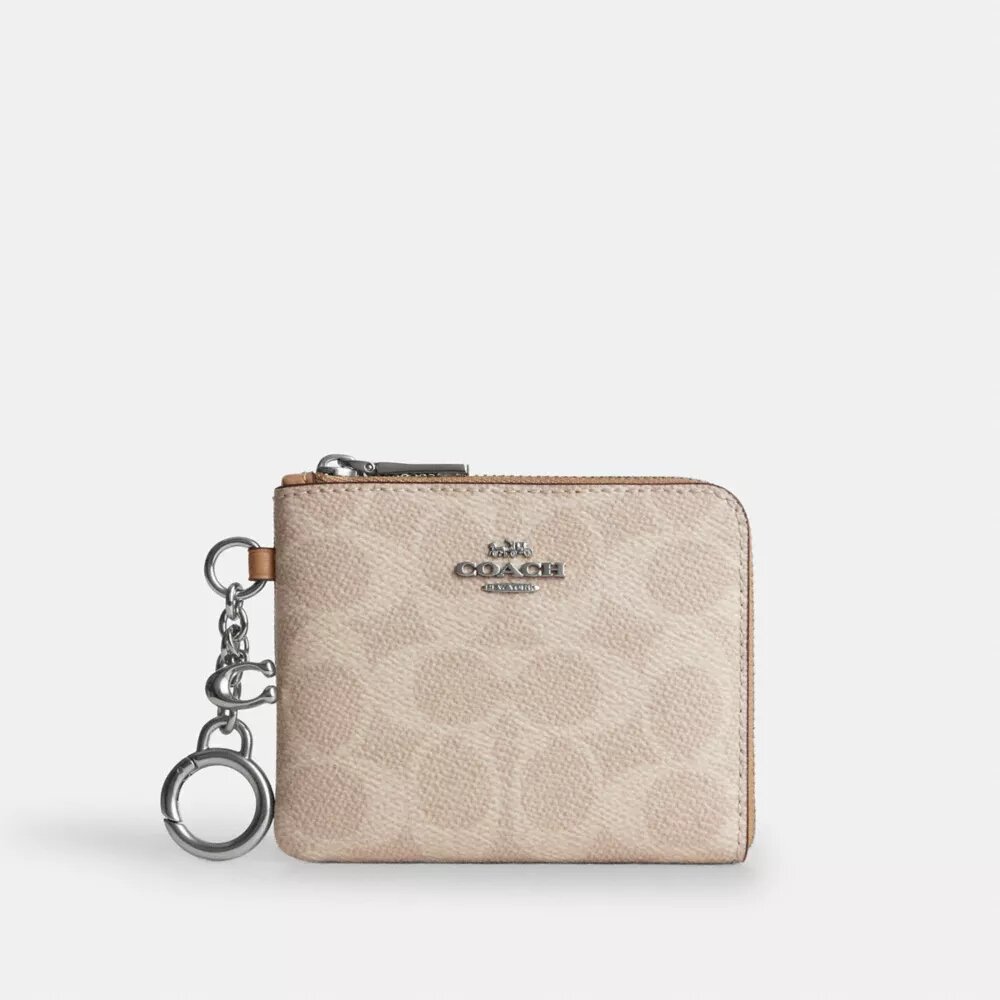 Cartera pequeña con cremallera en las esquinas de Signature Canvas