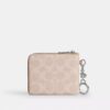 Cartera pequeña con cremallera en las esquinas de Signature Canvas