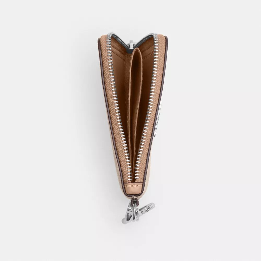 Cartera pequeña con cremallera en las esquinas de Signature Canvas