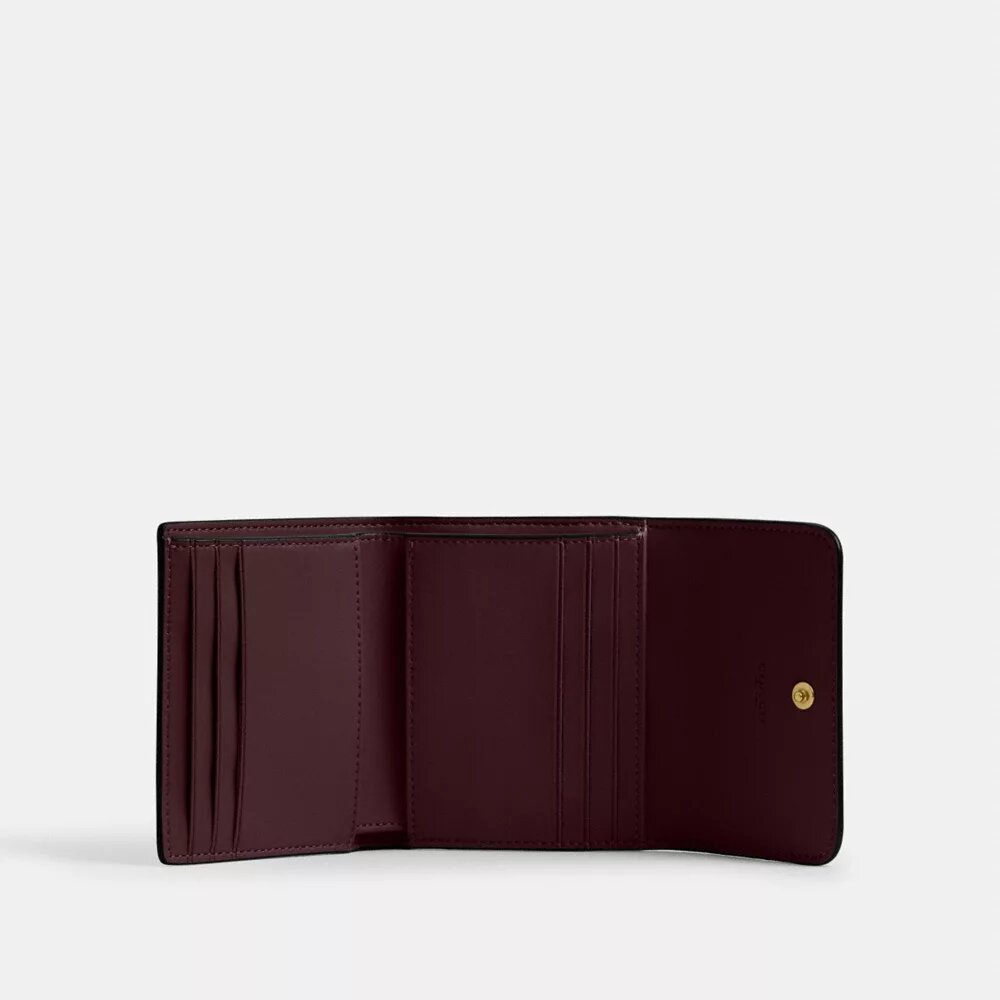 Cartera pequeña con solapa Mila en color block