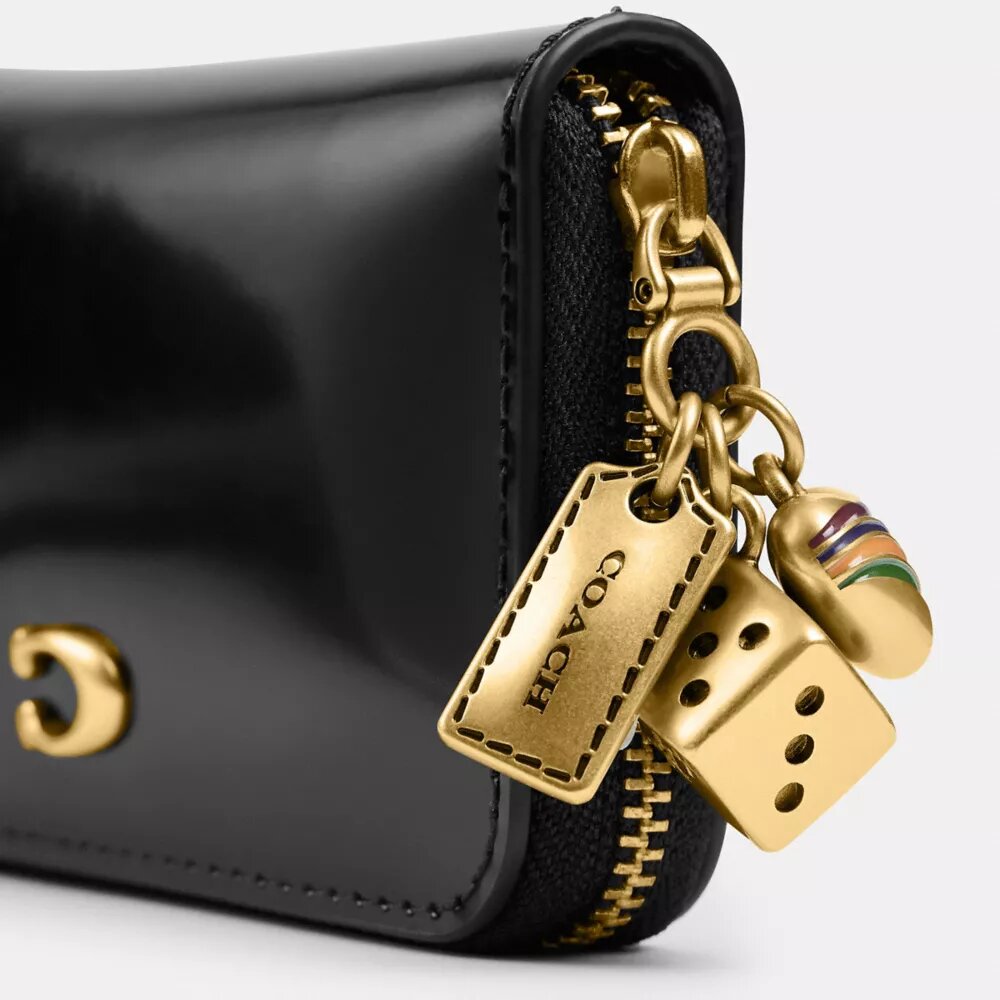 Cartera pequeña Essential con cremallera y Charms
