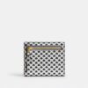 Cartera pequeña Mila con solapa y estampado de corazones