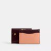 Cartera portatarjetas esencial en color block