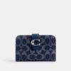 Cartera Tabby en denim característico