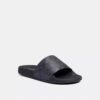 Chanclas deportivas Udele en Signature Canvas