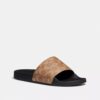 Chanclas deportivas Udele en Signature Canvas