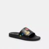 Chanclas Disney x Coach sin cordones con estampado de pegatinas