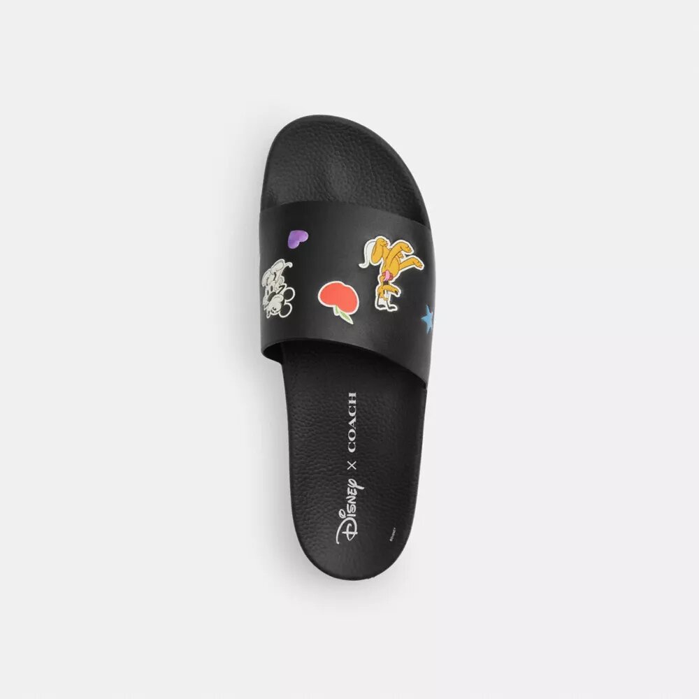 Chanclas Disney x Coach sin cordones con estampado de pegatinas