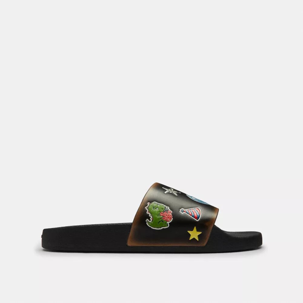 Chanclas sin cordones «Rexy 10th Birthday» con estampado de pegatinas