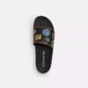 Chanclas sin cordones «Rexy 10th Birthday» con estampado de pegatinas