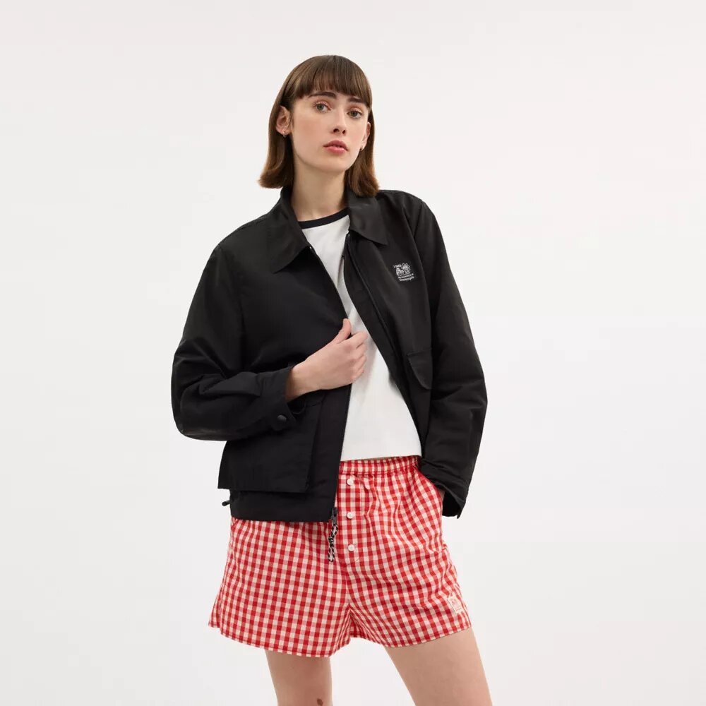 Chaqueta corta tipo cargo con presillas Coachtopia