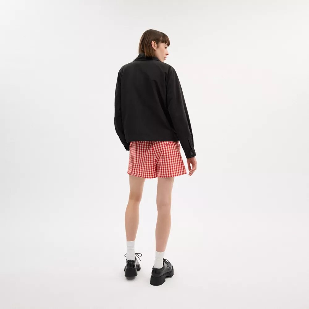 Chaqueta corta tipo cargo con presillas Coachtopia