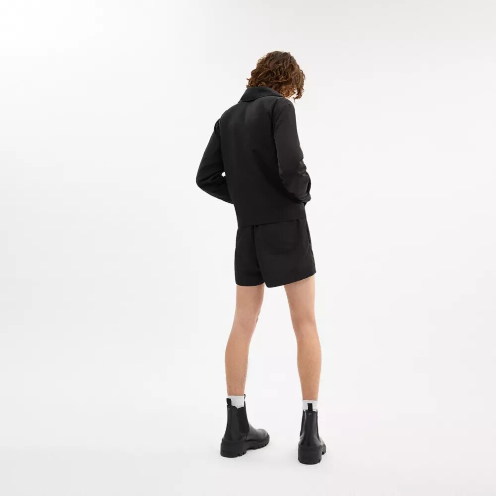 Chaqueta corta tipo cargo con presillas Coachtopia