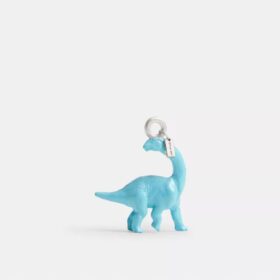 Colgante de zapato con dinosaurio pequeño