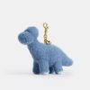 Colgante para bolsos «Buddy Dinosaur» de Rexy, con motivo del 10.º cumpleaños, en piel de oveja
