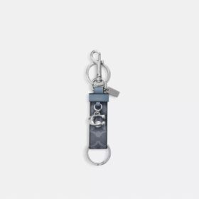 Colgante para bolsos con cierre a presión en Signature Canvas y Charms