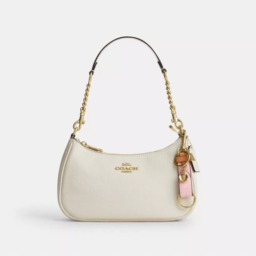Colgante para bolsos con cierre de gatillo en Signature Canvas con colgante de corazón