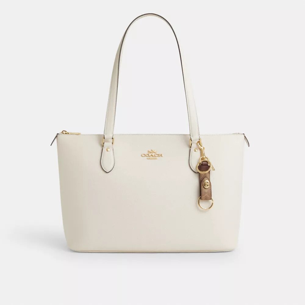 Colgante para bolsos con cierre de presión en Signature Canvas