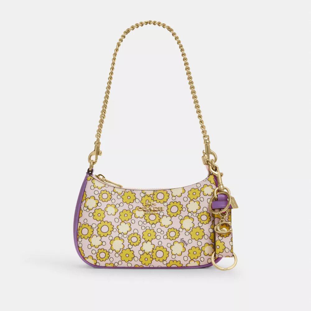 Colgante para bolsos con cierre de presión y estampado floral
