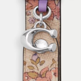 Colgante para bolsos con cierre de presión y estampado floral