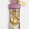 Colgante para bolsos con cierre de presión y estampado floral