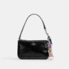 Colgante para bolsos con cierre de presión y estampado floral