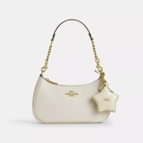 Colgante para bolsos con forma de estrella en piel exclusiva