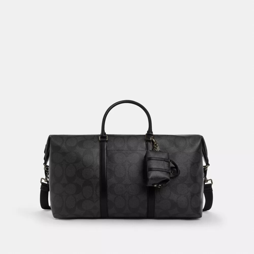 Colgante para bolsos «Mini Trekker» en Signature Canvas