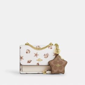 Colgante para bolsos «Star» en Signature Canvas