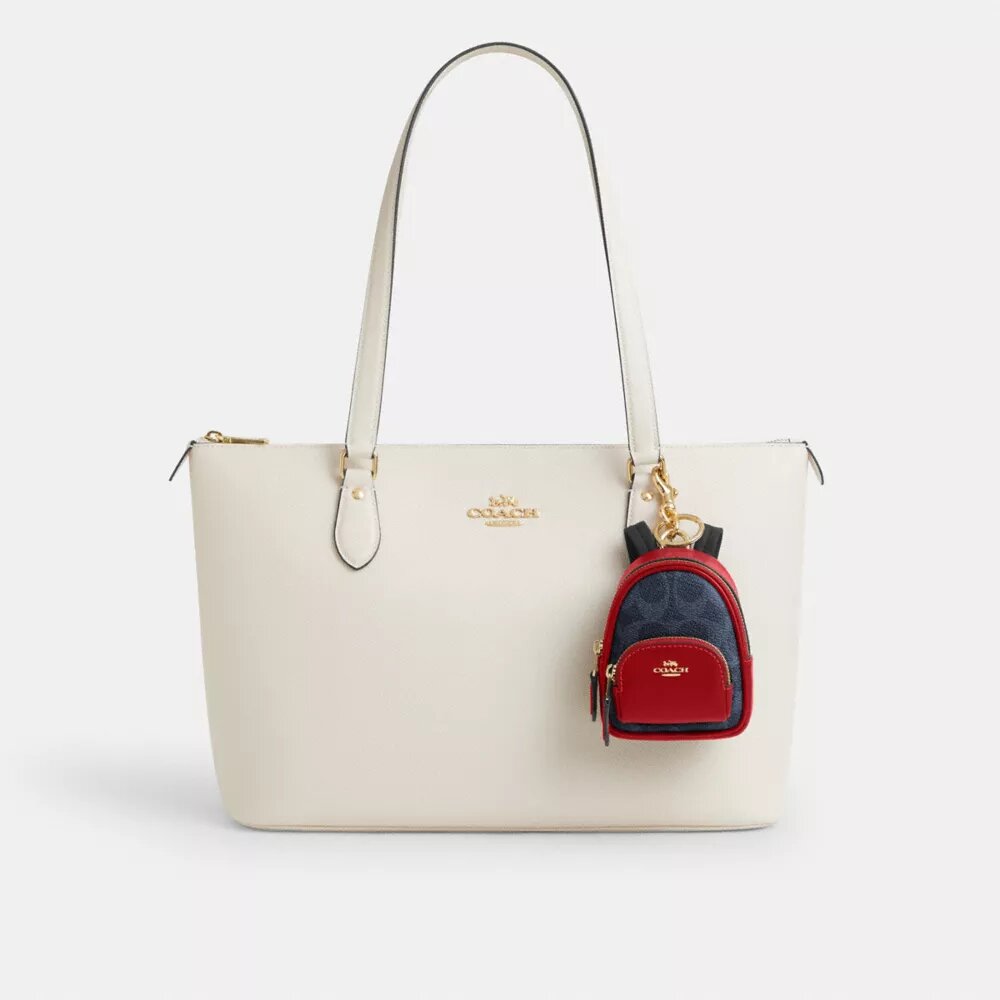 Colgante para mochila Mini Court en Signature Canvas