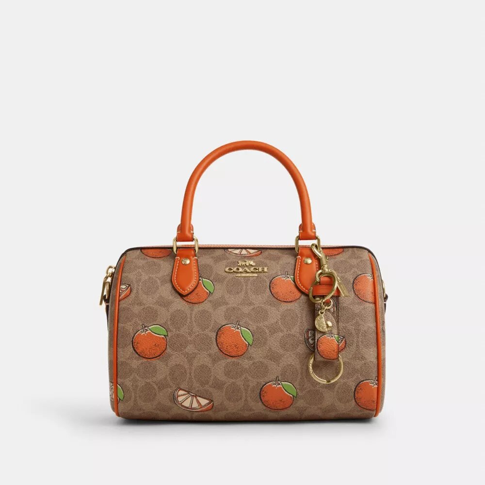 Colgantes para bolsos con cierre a presión en Signature Canvas con estampado naranja