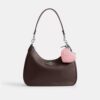 Colgantes para bolsos en forma de corazón en piel exclusiva con colgante de corazón