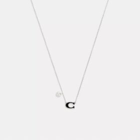 Collar con colgante de corazón esmaltado con nuestro sello característico