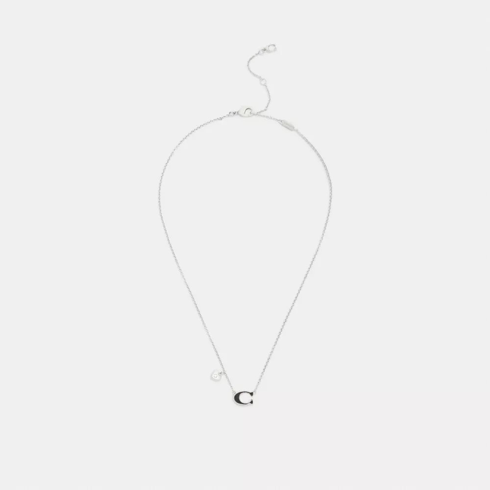 Collar con colgante de corazón esmaltado con nuestro sello característico