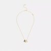 Collar con rondelles en forma de C repetidas