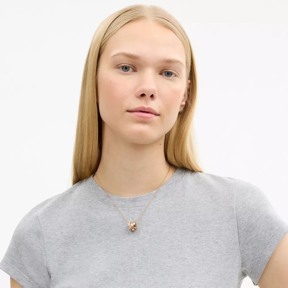 Collar con rondelles en forma de C repetidas